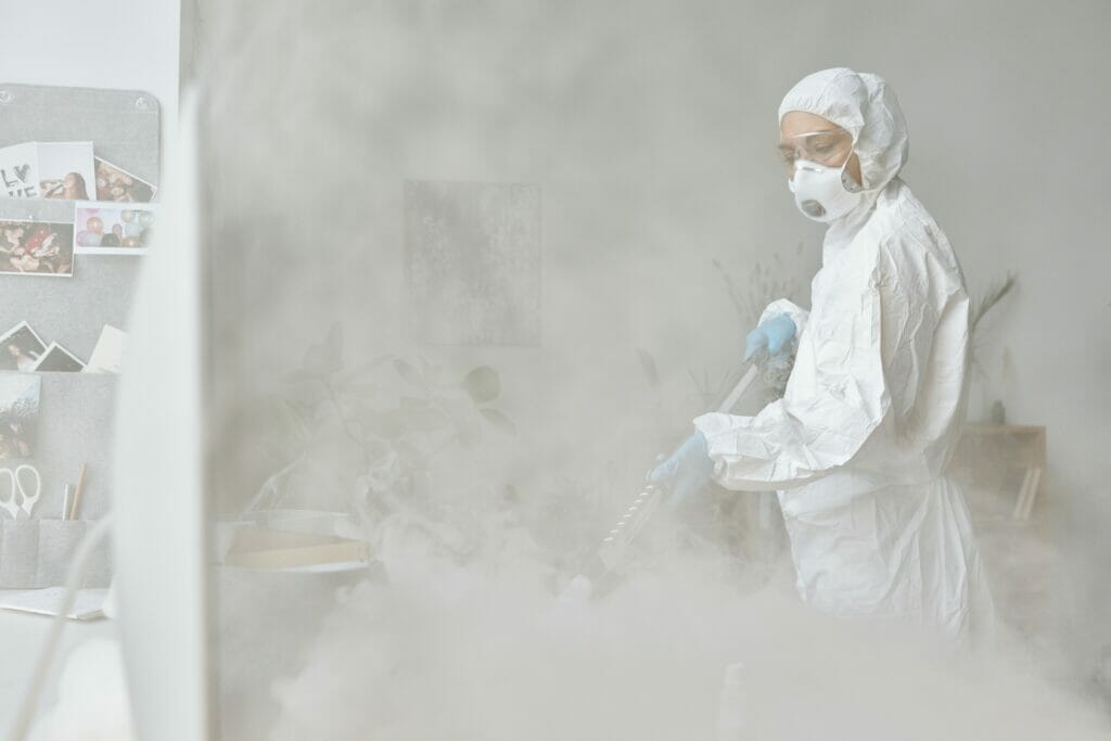 Pest control technician carrying out the fumigation process in a London home